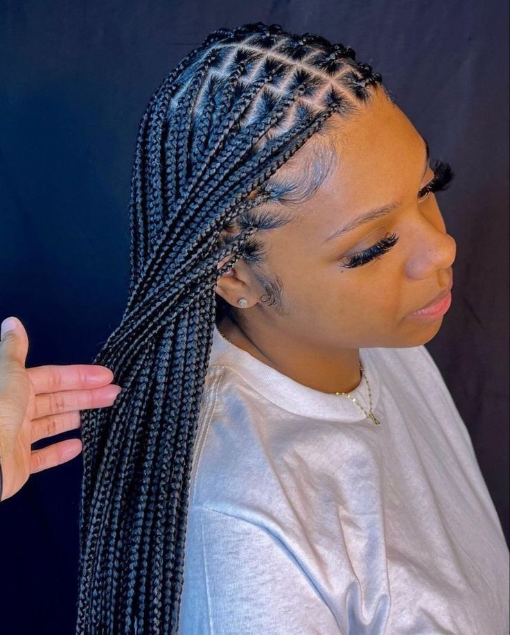 (4) BOX BRAID SMALL MEDIUM WAIST LENGTH WITH HAIR INCLUDED.